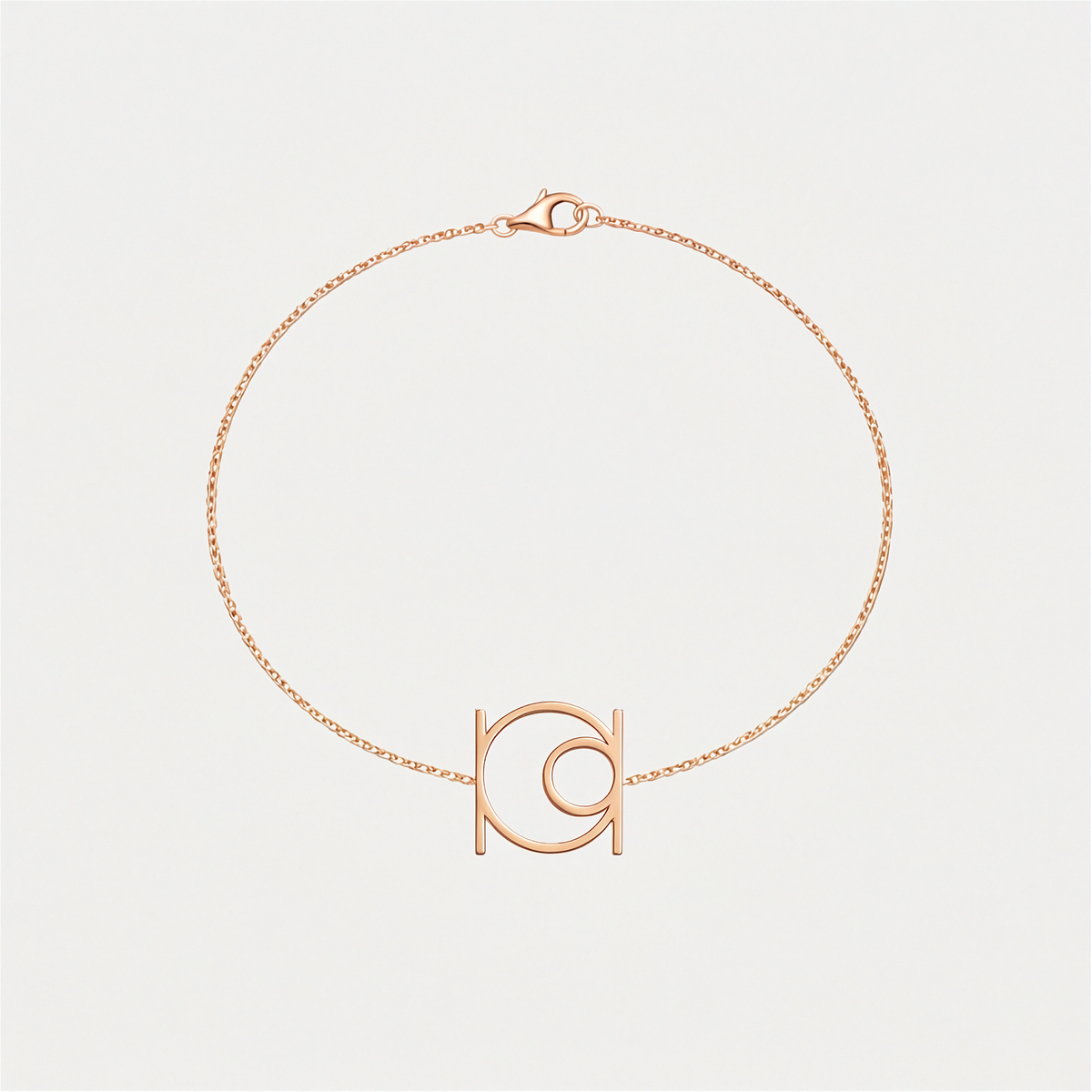 Minimalist 9k rose gold , single symbol, Danibydsgn cut out symbol bracelet on a delicate solid gold chain. Hand made, made to order, Danibydsgn jewelry.