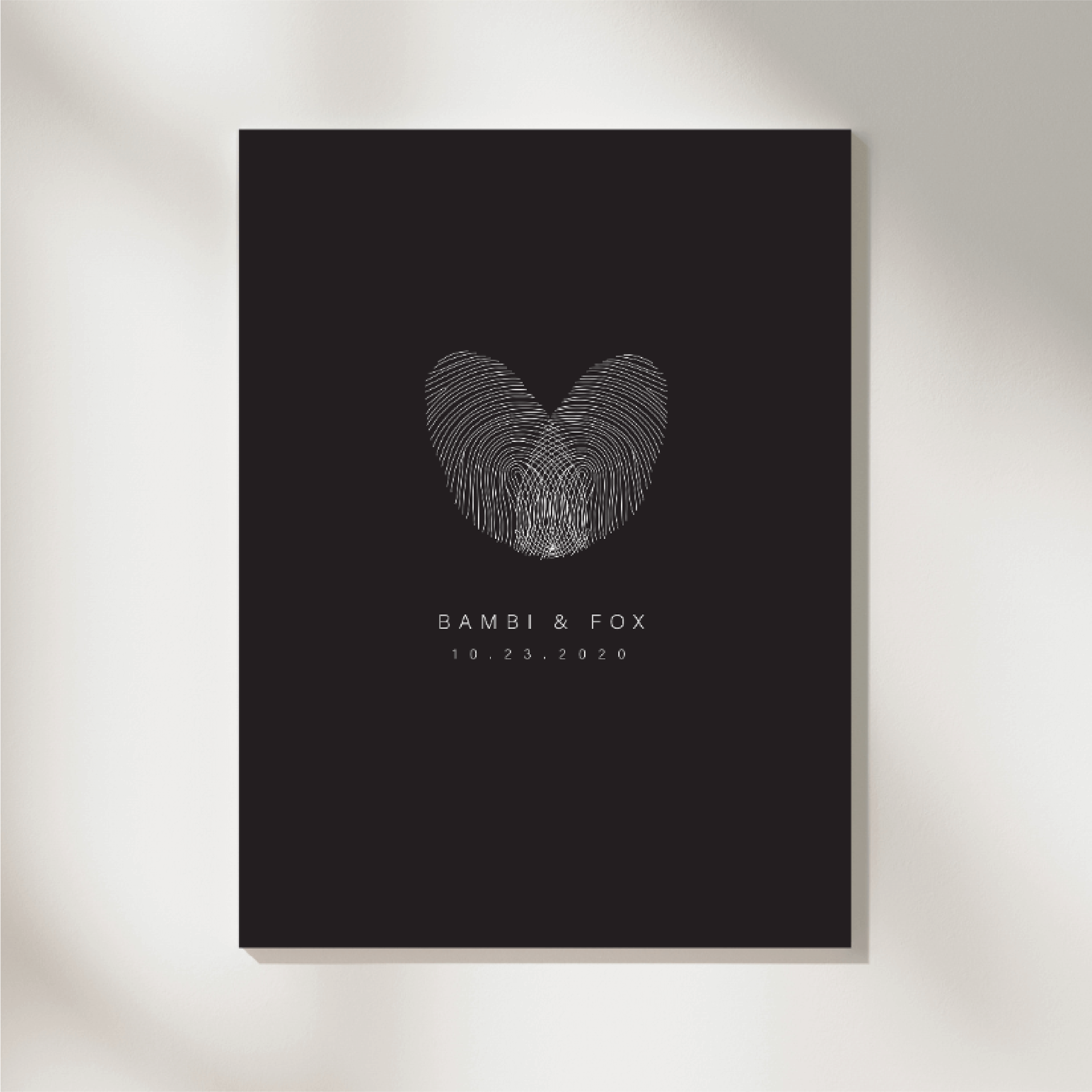 Two thumbprints overlapped to create a fingerprint art heart design. This design was framed and used as home décor wall art. This design is also ideal for engraving onto our Danibydsgn's custom jewelry collection. This Fingerprint Art captures the essence of Bambi & Fox's romantic story. Perfect as an artful imprint as distinctive wall art for home décor or even engraved onto custom jewelry, it embodies bespoke elegance and heartfelt memories.