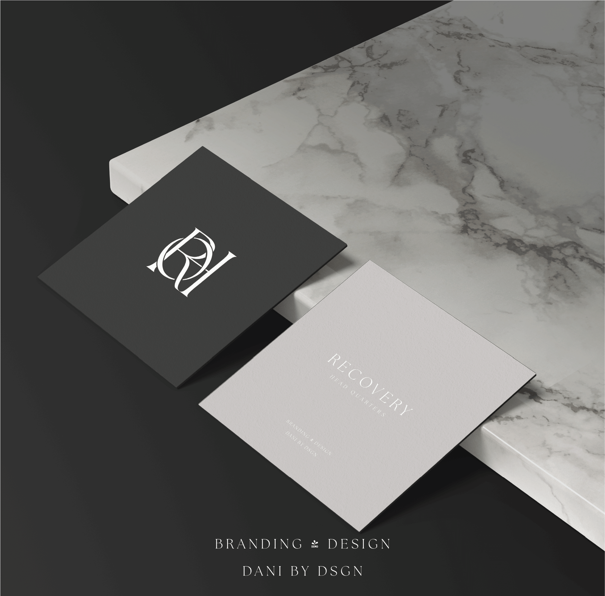 The initials RQH for Recover Head Quarters designed into a initial monogram Business Initial Monogram Design. Initials are in capitals and overlapped to create a striking design. This pic is of the branding on business cards with white initials on black background. This initial monogram logo design is created by Danibydsgn, a specialist in business branding and small business logo design. This business monogram logo, designed by an experienced graphic designer, is a testament to bespoke business branding.