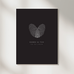 Elegant fingerprint heart art print by Danibydsgn featuring two overlapping fingerprints forming a heart shape with personalized names and date, perfect for modern couple wall decor or anniversary gifts.