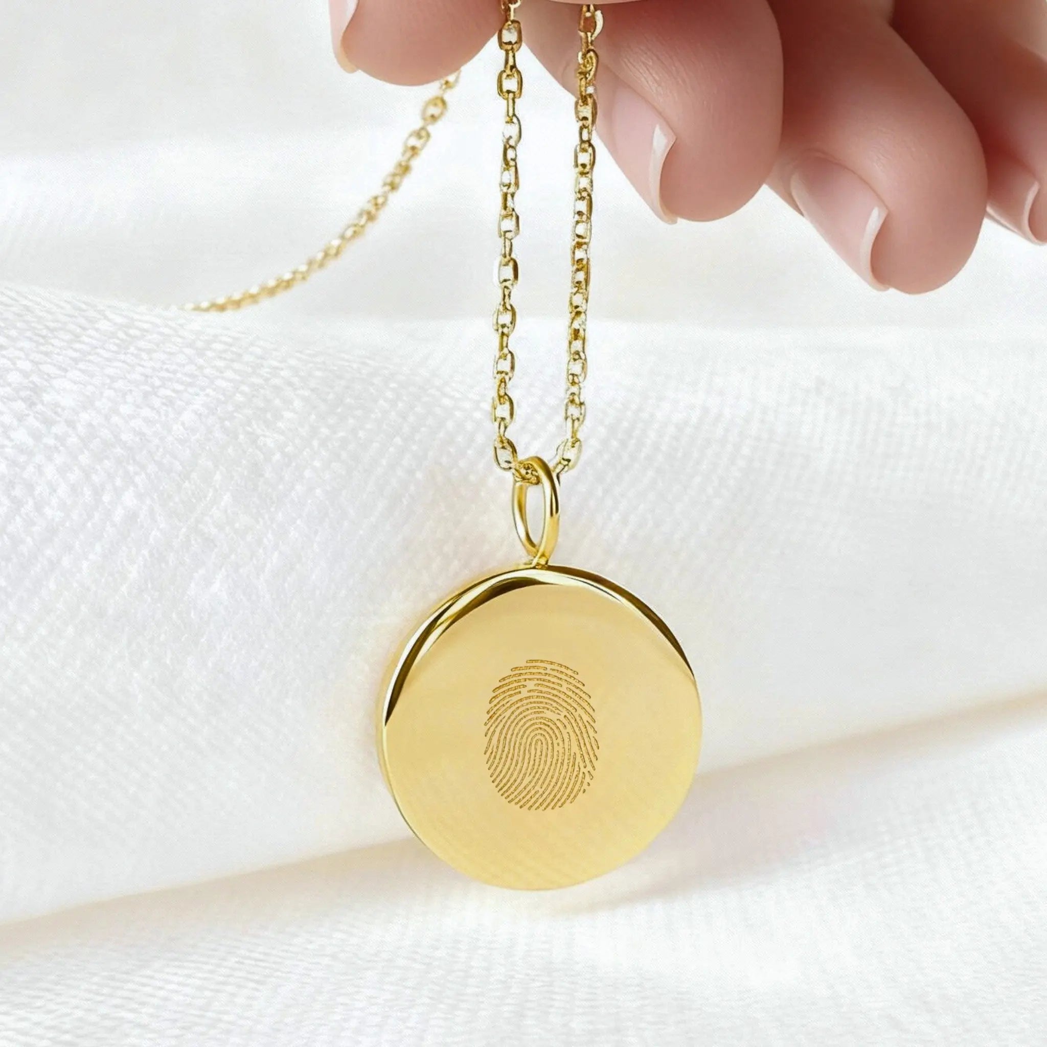 Custom single fingerprint coin necklace in 18k gold vermeil by Danibydsgn, featuring a unique pendant design.