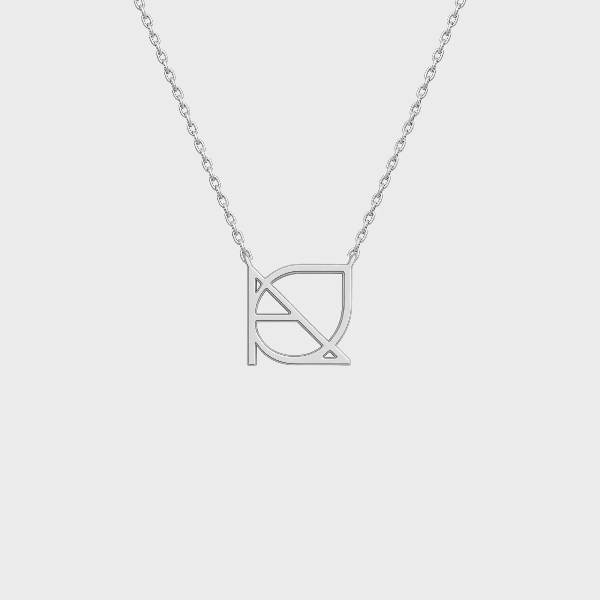 Danibydsgn custom symbol necklace in 925 sterling silver, featuring a cut-out silhouette pendant on a fine chain (front view).