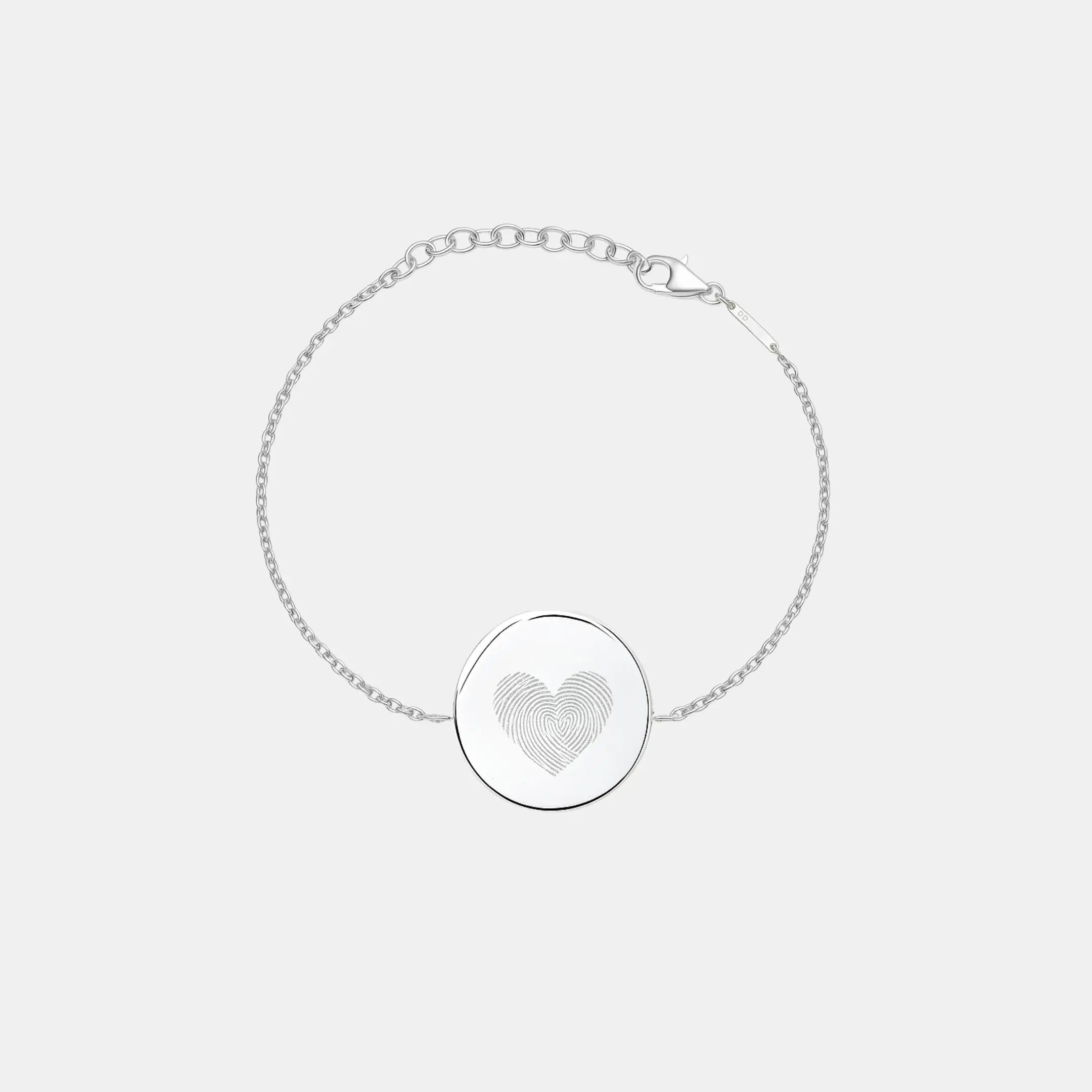 Heart fingerprint coin bracelet in 925 sterling silver, featuring a delicate design and textured coin detail.
