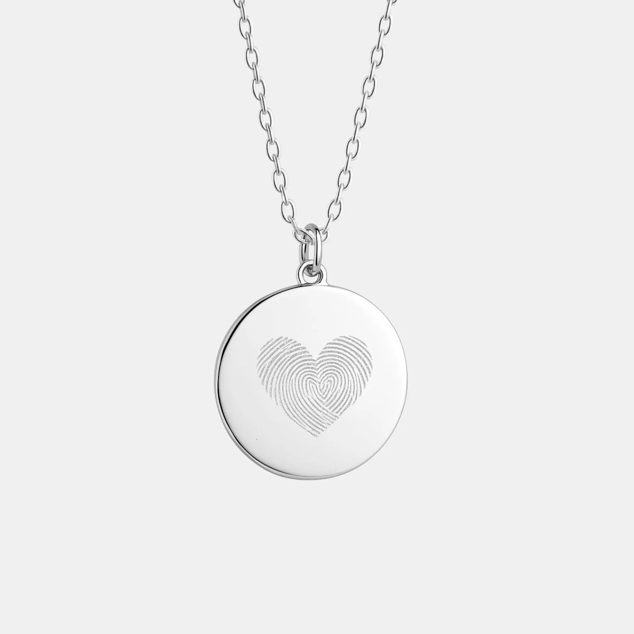 Heart Fingerprint Pendant Necklace by Danibydsgn in 925 Sterling Silver, featuring two fingerprints delicately engraved to form a heart — a timeless personalised keepsake symbolising love, memory, and connection.