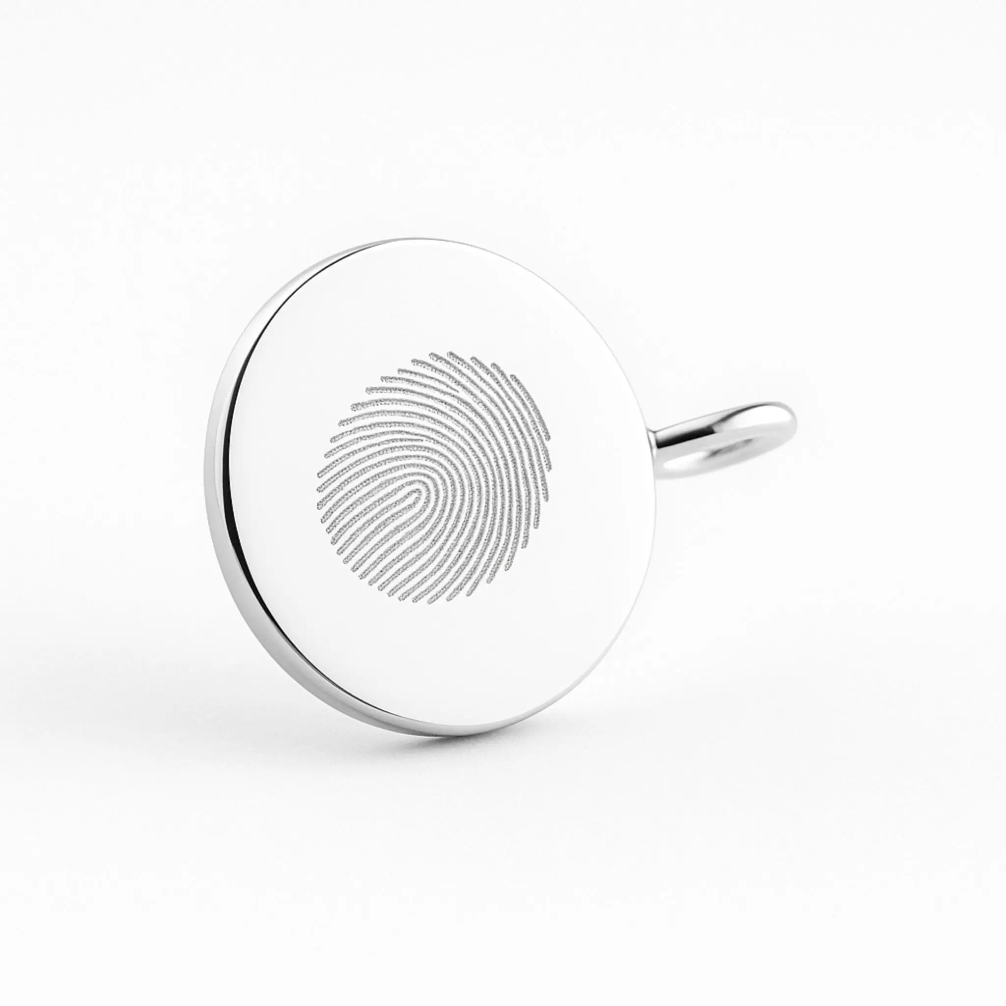 Single fingerprint coin necklace in 925 sterling silver by Danibydsgn, featuring detailed engraving and elegant design.