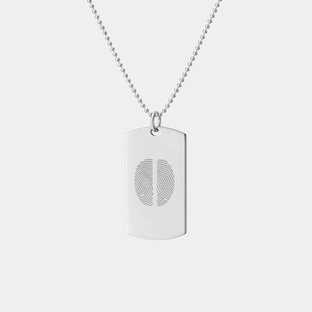 Danibydsgn 925 sterling silver dog tag pendant with custom diamond-engraved two side-by-side fingerprint design, displayed hanging on adjustable bead chain