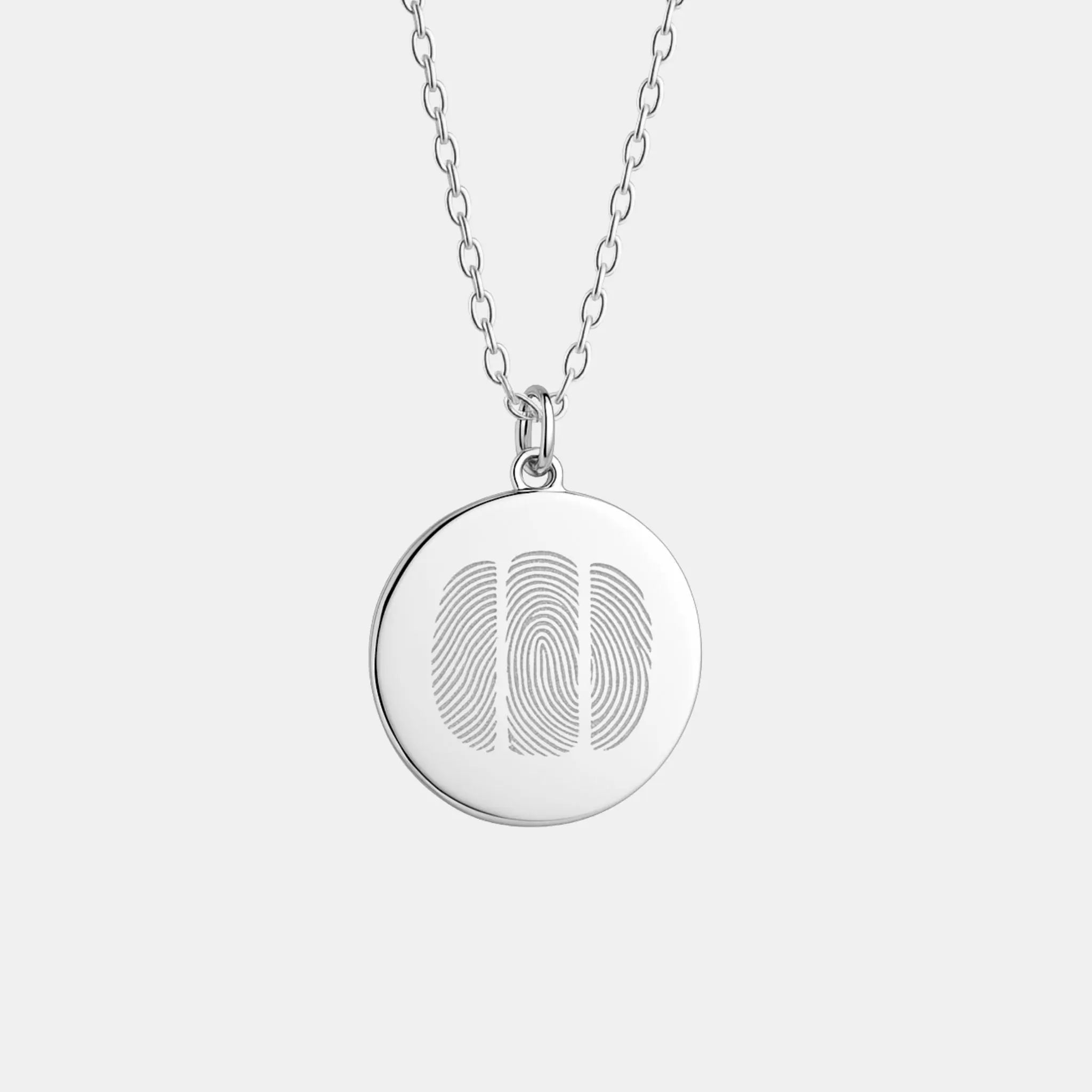 Danibydsgn Three Fingerprint Pendant Necklace in 925 Sterling Silver featuring three detailed fingerprint engravings on a polished 16mm coin pendant — a luxury keepsake symbolizing family, love, and lasting connection.