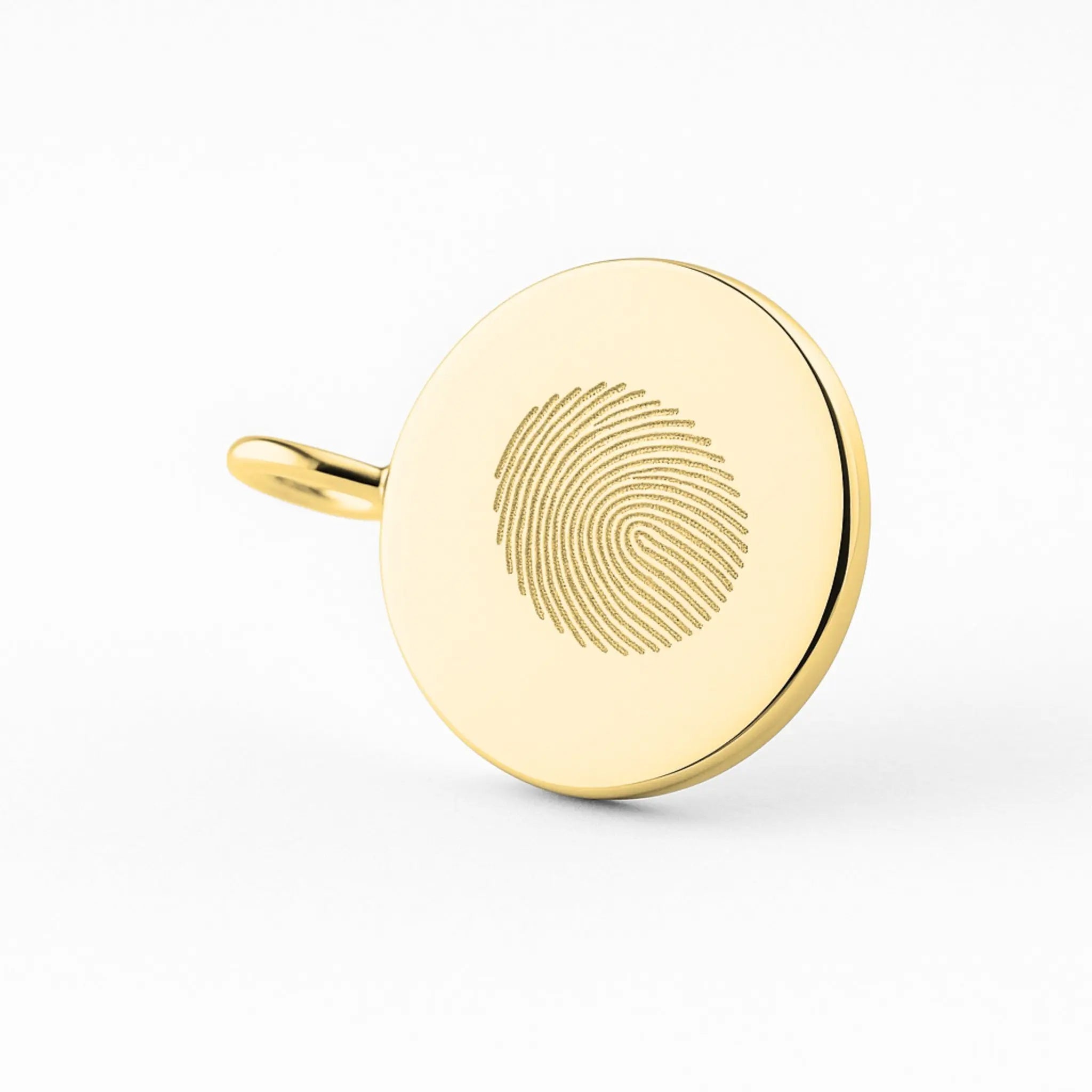 Close-up of Danibydsgn's 18k gold vermeil single fingerprint coin necklace, showcasing intricate design and craftsmanship.