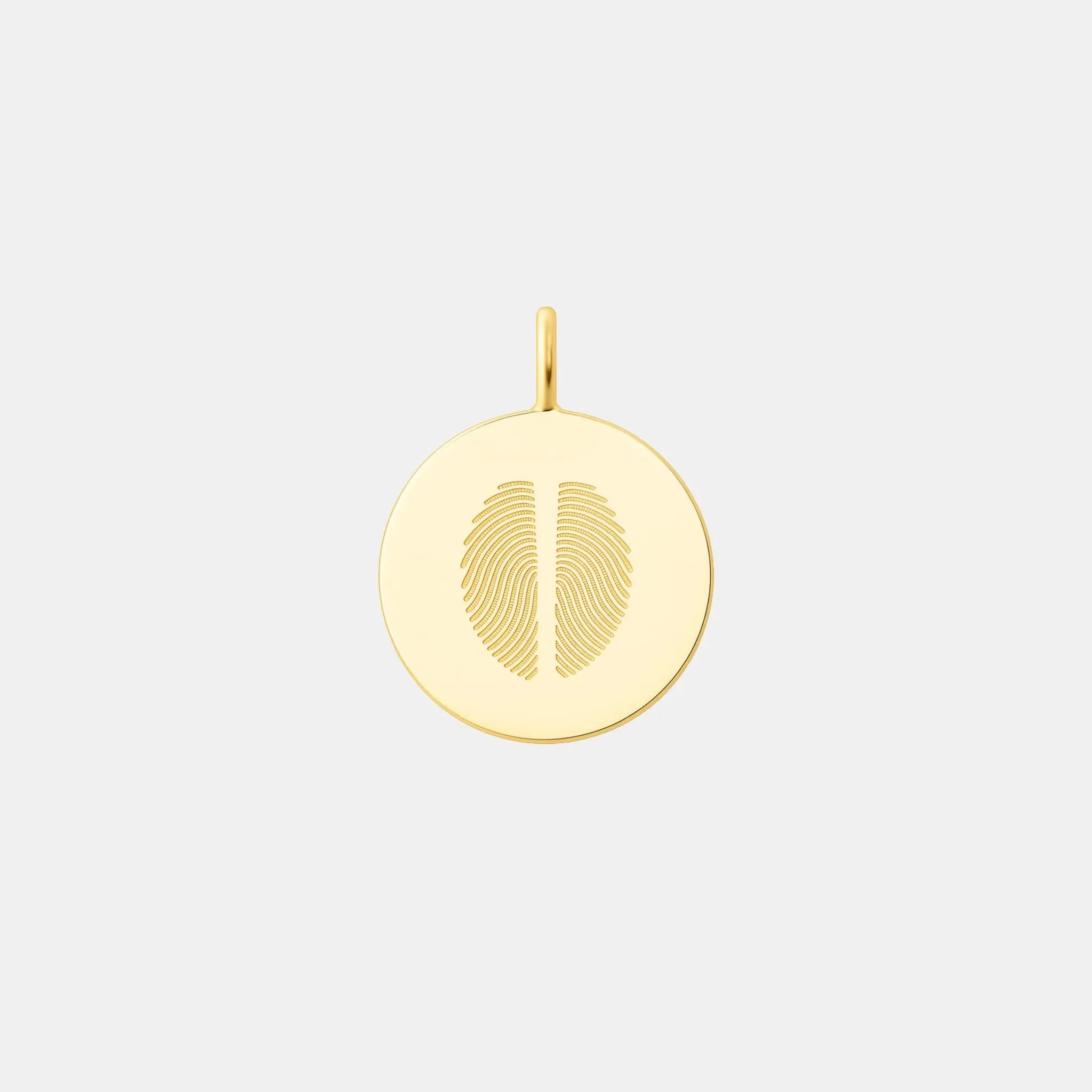 Minimalist two fingerprint pendant crafted in 18K gold vermeil by Danibydsgn. Features dual engraved fingerprints on a polished circular disc—an elegant, meaningful keepsake symbolizing love, unity, and connection. Perfect for luxury personalized jewelry collections.