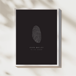 Modern fingerprint wall art by Danibydsgn featuring a single fingerprint design with custom name and date text, framed and styled for elegant home or office wall decor.