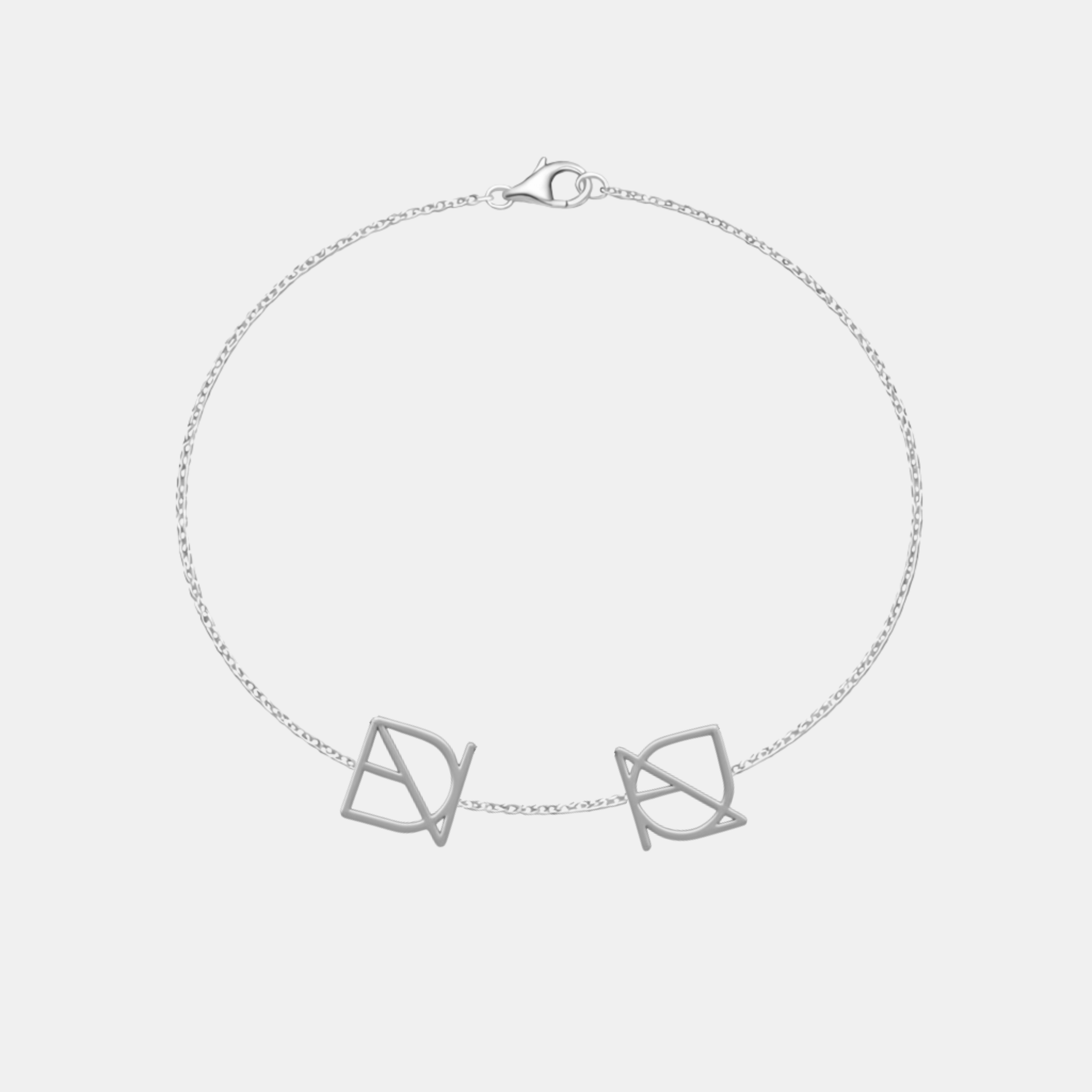 Handcrafted sterling silver bracelet with two unique custom-designed symbols, ideal for a personalized gift.