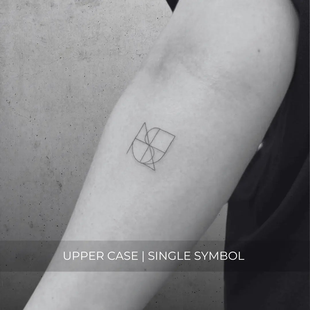 Uppercase fine line monogram tattoo design featuring a custom logo by Danibydsgn, showcasing intricate symbols.