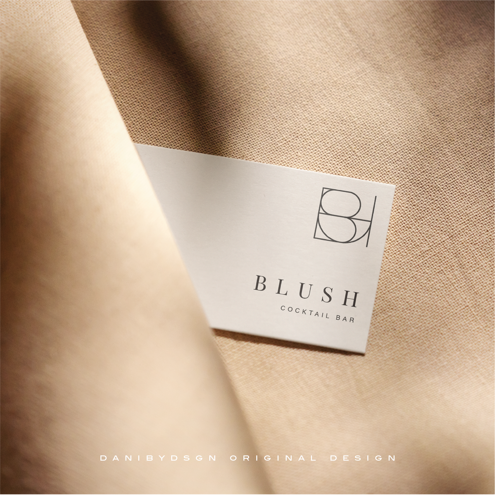 An elegant business card from Danibydsgn's Business Logo Design & Branding Kit, featuring the 'BLUSH Cocktail Bar' logo. The sophisticated design highlights the brand's identity and is a testament to the quality work of our business logo designs, suitable for website branding, weddings, clothing branding and event promotions. Danibydsgn's work as a graphic designer is evident, reflecting high-standard branding