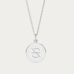 Created from high-quality 925 sterling silver, this pendant necklace elegantly showcases a Danibydsgn custom name logo, intricately engraved inhouse for a personal touch. Not just a keepsake necklace, it transcends into everyday luxury. Also available as a custom engraved necklace in 9ct gold and 18k gold vermeil, it's an ideal choice for those seeking a meaningful piece of jewelry that captures their personal story or as a refined memorial necklace.  This pic shows an engraved pendant on a silver chain.