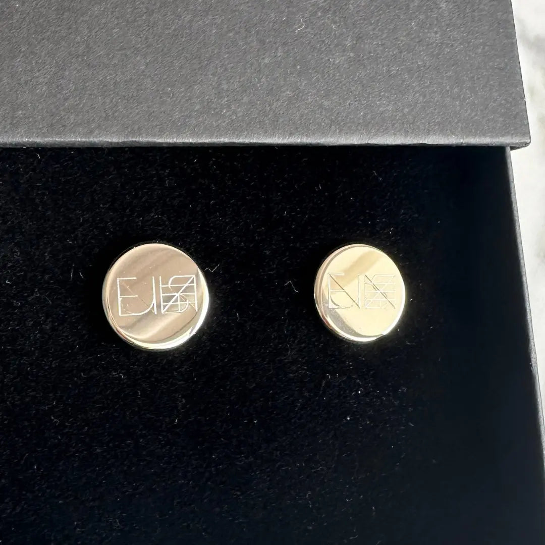 Engraved 925 sterling silver cufflinks by Danibydsgn, showcasing intricate design and polished finish.