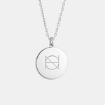 925 sterling silver luxury pendant necklace, engraved with a custom Danibydsgn, one symbol design hanging on a fine cable chain and against a light coloured background. 