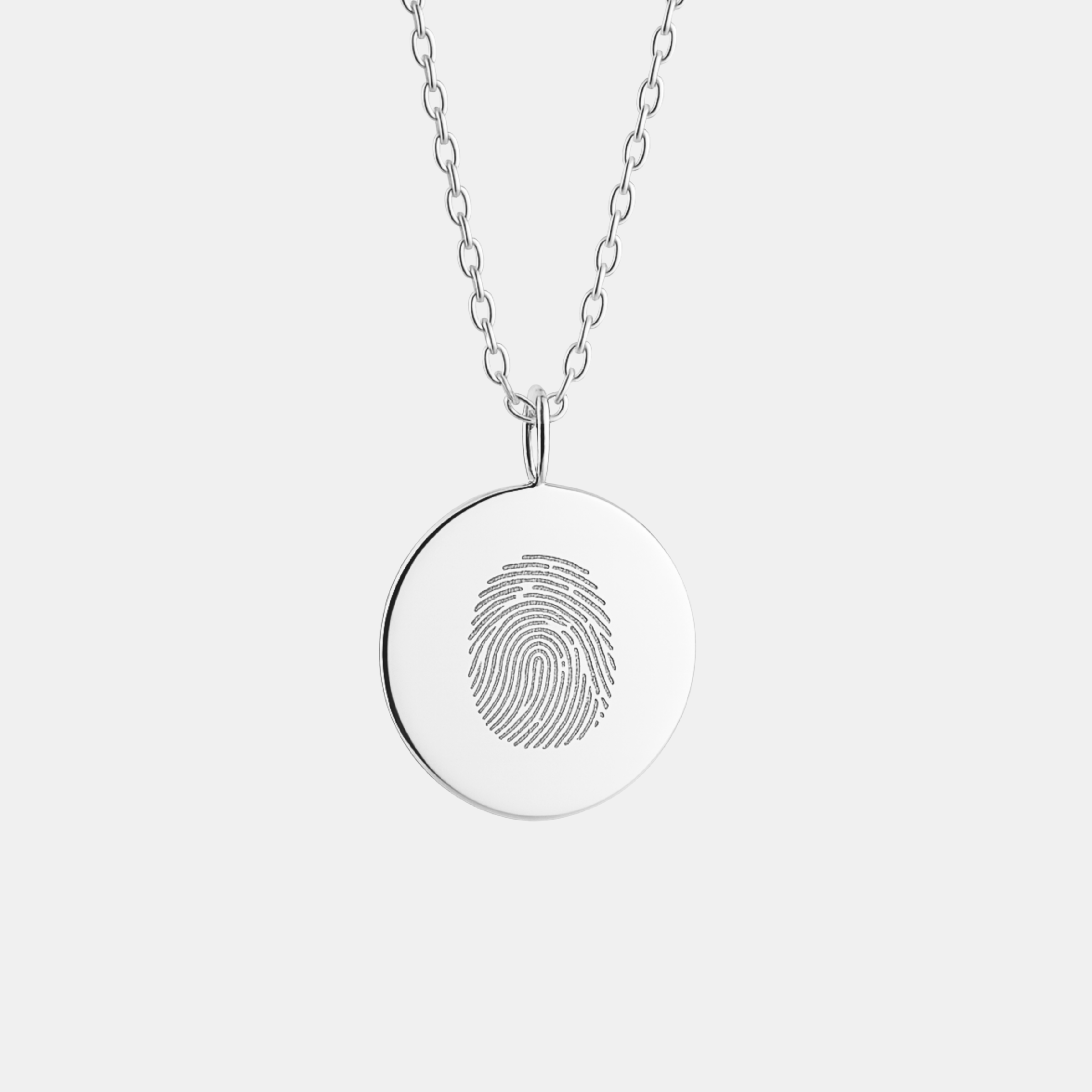 925 Sterling Silver necklace with a  luxury coin round pendant featuring a  single fingerprint on a light background.