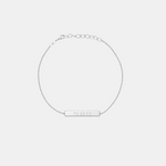 925 Sterling Silver  luxuy bar bracelet engraved wth a custom Danibydsgn three symbol design on a light gray background