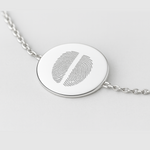 925 Sterling Silver bracelet with a circular coin pendant design engraved with two fingerprints, on a light background.