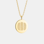 18k Gold Vermeil necklace with a round pendant featuring 3 fingerprint design on a light gray background