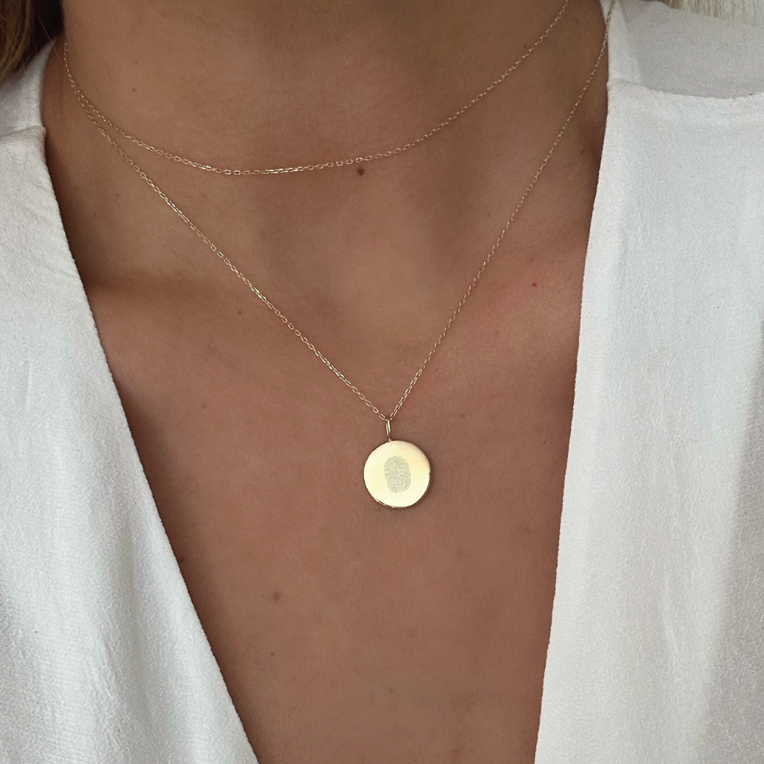 Single fingerprint design coin pendant necklace in 18k Gold Vermeil , on an adjustable matching chain.  Meaningful, elegant, luxurious.  More than just jewelry it's a meaningful momento.