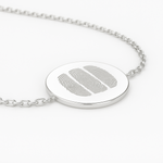 925 Sterling Silver necklace with a round pendant featuring athree engraved fingerprints on a white background