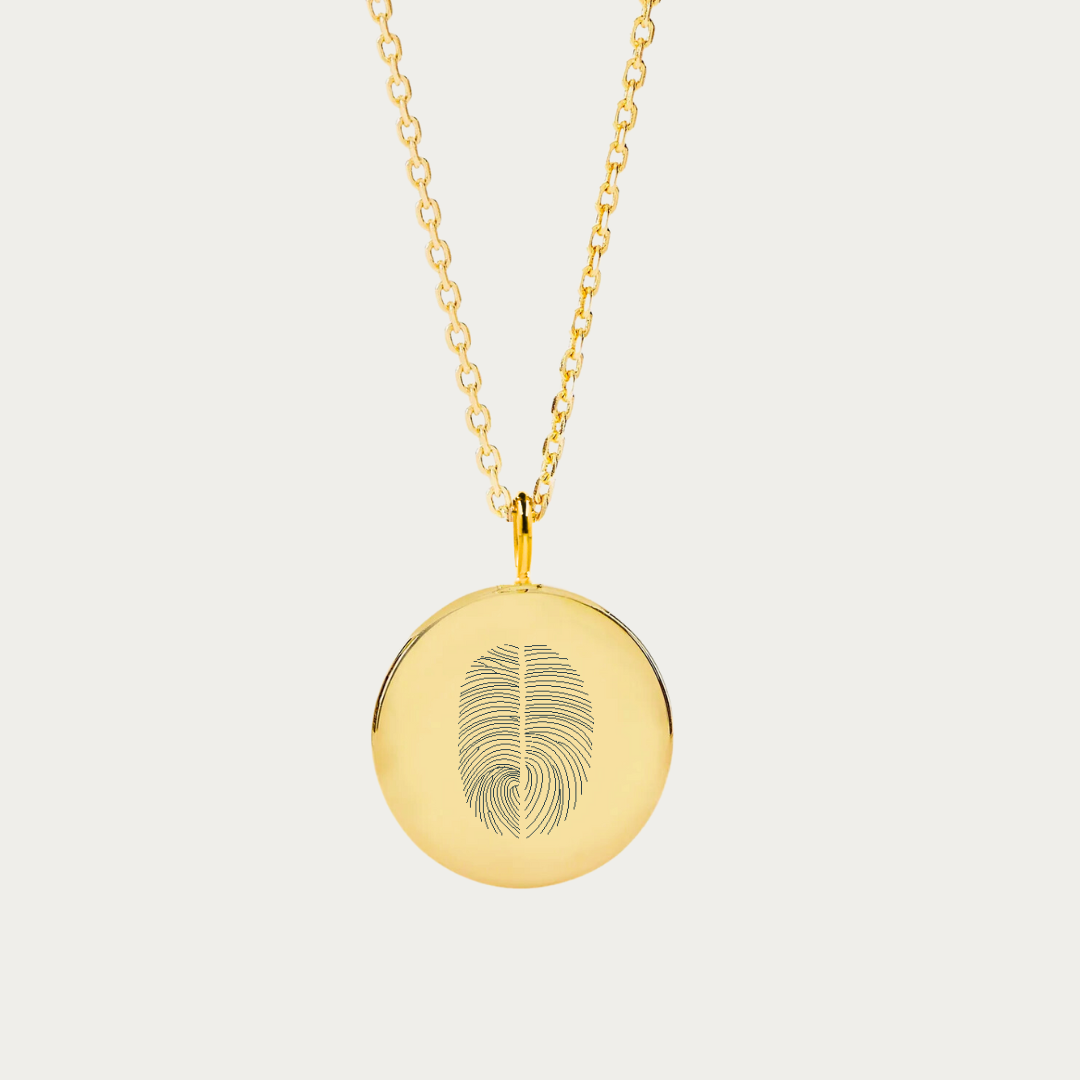 Elegant 18k gold vermeil coin pendant necklace featuring a duo fingerprint design, a bespoke piece from the fingerprint jewelry collection. This custom necklace, an exquisite choice for a personalized gift, offers a unique twist on the classic engraved necklace. Each piece is a testament to individuality, capturing a personal touch in high-quality, luxury two fingerprint pendant necklace.  This beautiful engraved necklace is the perfect personalized gift for someone special