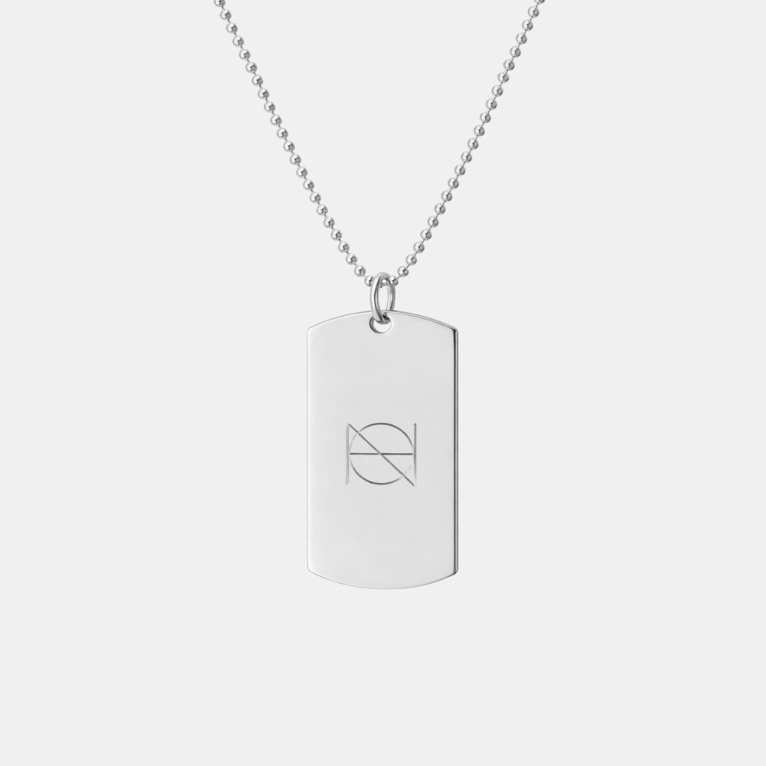 Danibydsgn 925 sterling silver custom dog tag pendant with engraved single uppercase overlapping symbol on adjustable bead chain
