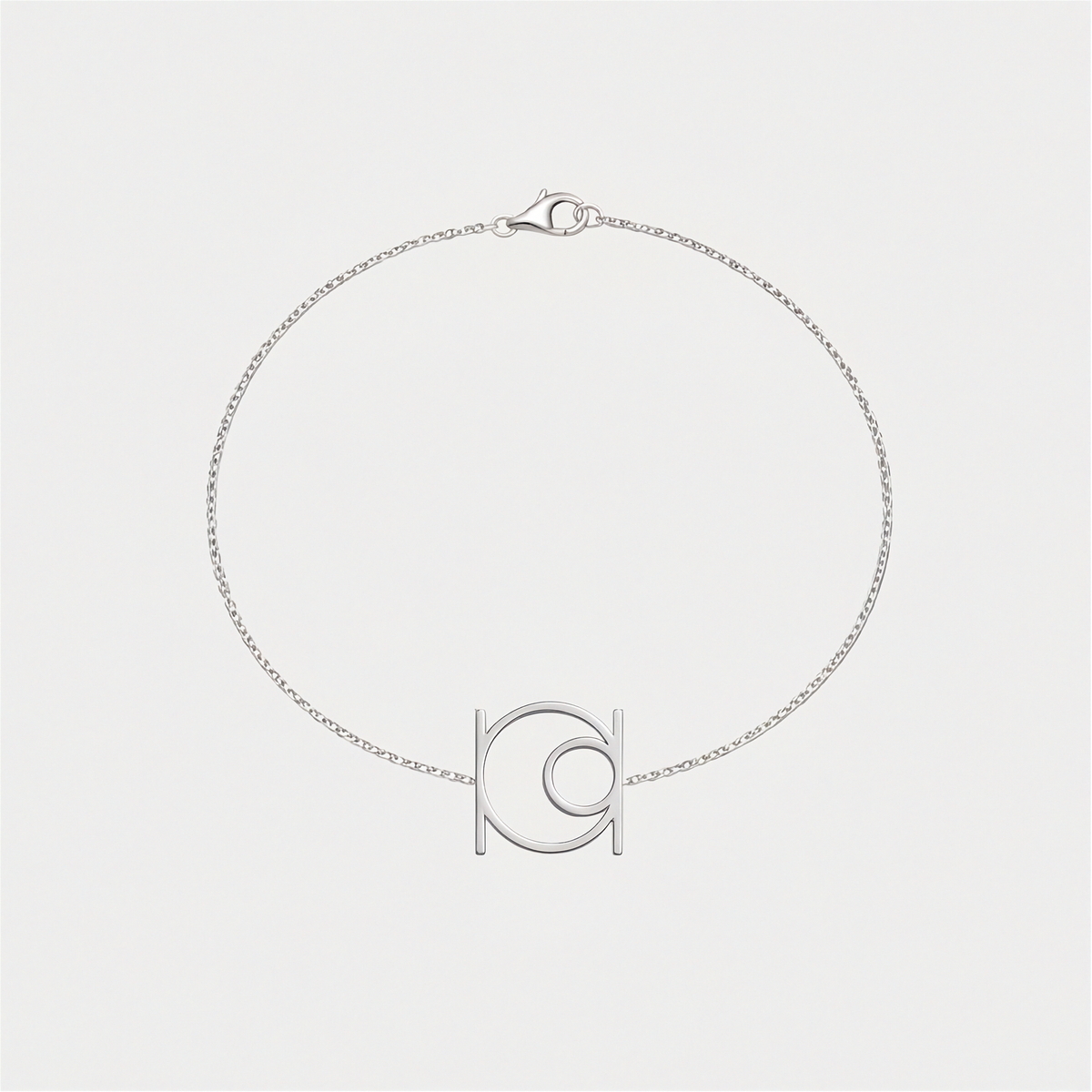 Minimalist 9k white gold , single symbol, Danibydsgn cut out symbol bracelet on a delicate solid gold chain.  Hand made, made to order, Danibydsgn jewelry.