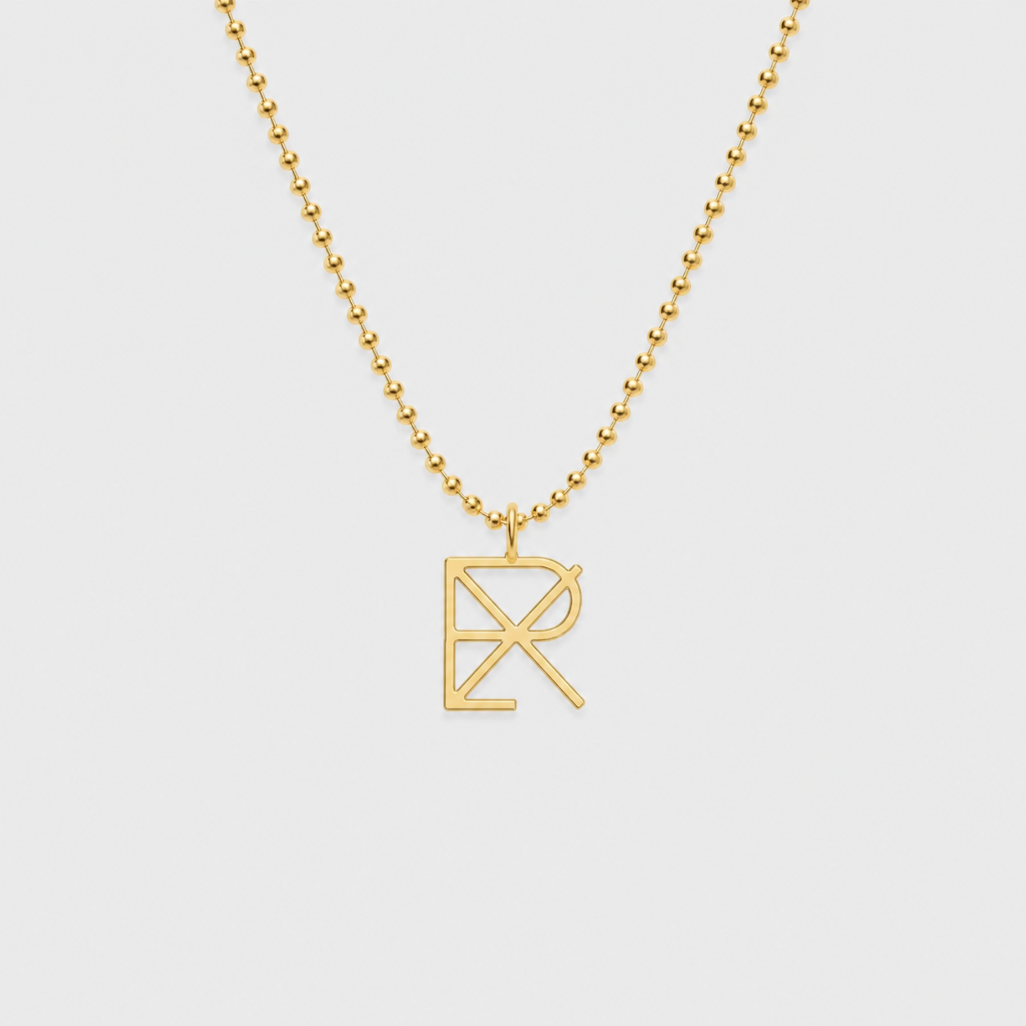 A 9k gold ball chain necklace featuring a Danibydsgn design cut out pendant in 1.7mm x 1.7mm size  shown against a light gray background. Custom personalised jewelry.