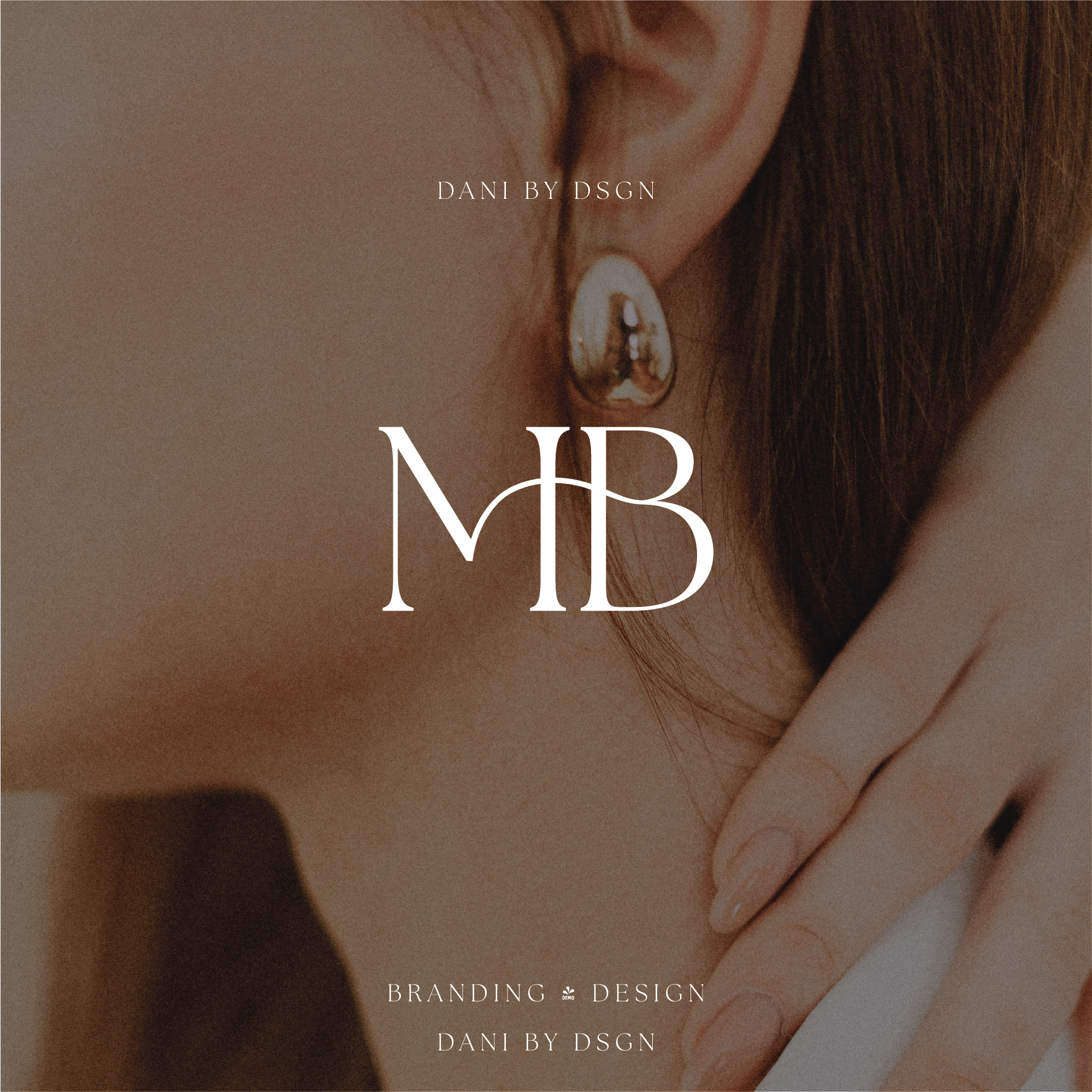 Two initials MB designed into a initial monogram business logo. Initials are in capitals and overlapped to create a striking elegant design.