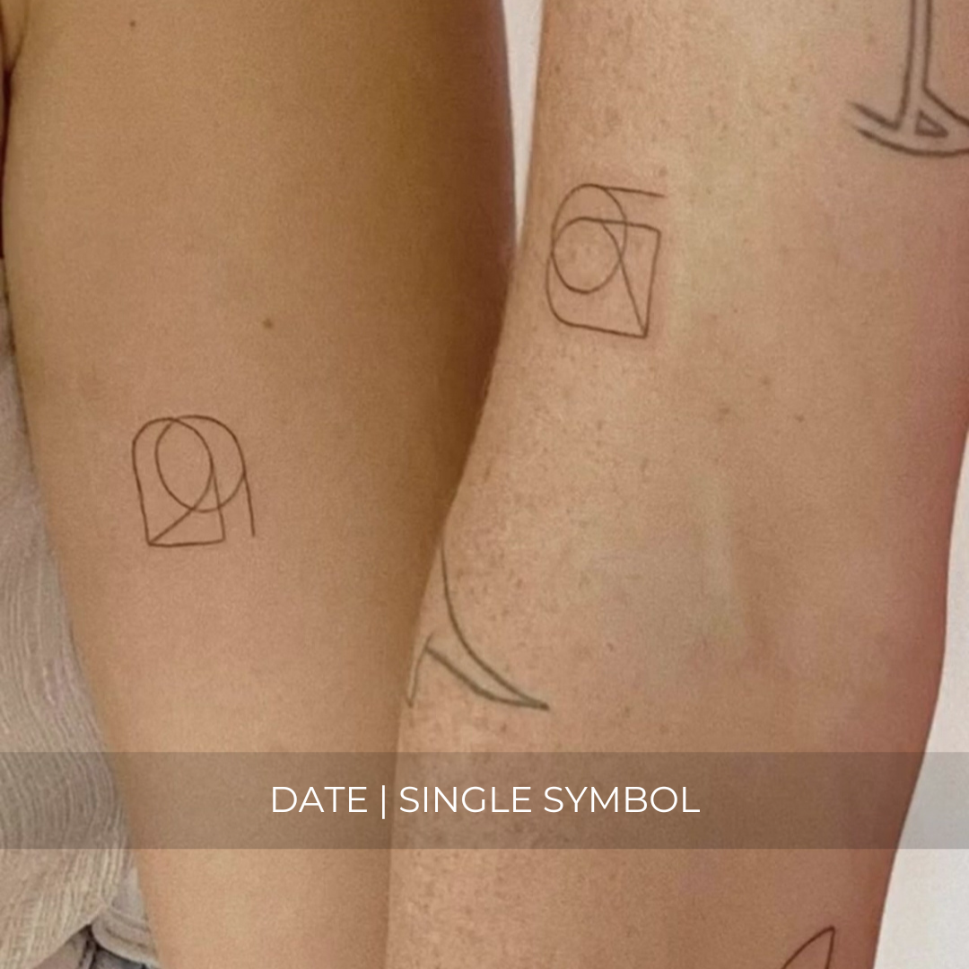 A minimalistic fine line tattoo of an overlapping number logo design on a couple’s arm of a single symbol date design, exemplifying custom logo design, name tattoo design, and body art. This simple tattoo idea showcases personal branding and tattoo art, ideal for both name logos and wall art applications.