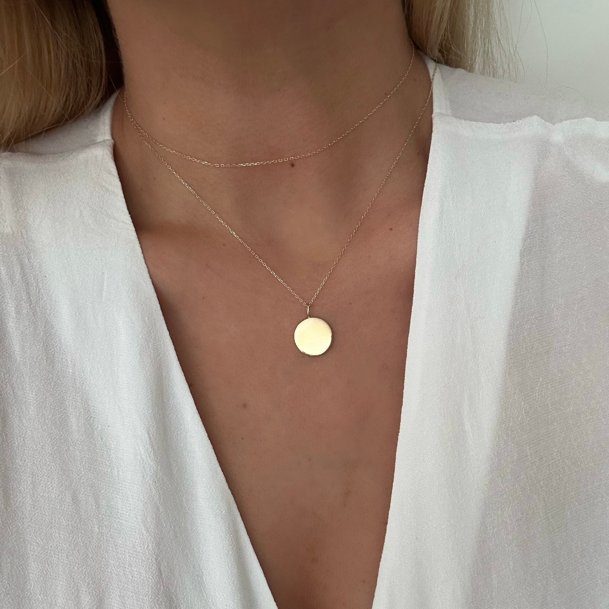 Showcase your unique style with our 18k gold vermeil, engravable coin necklace, a luxury jewelry piece that's perfect for personalization. An opulent canvas for your Danibydsgn custom logo design engraving. This necklace is not just a jewelry but a memorial keepsake that's as unique as you are. This engravable necklace is a significant addition to any collection, providing a personalized touch with your chosen meaningful design and also makes an extra special personalized gift. 