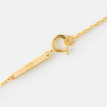 Close-up of Danibydsgn branded gold clasp — fine jewelry detail from the Luxury Three Fingerprint Coin Necklace in 18k Gold Vermeil, showcasing premium craftsmanship and design.