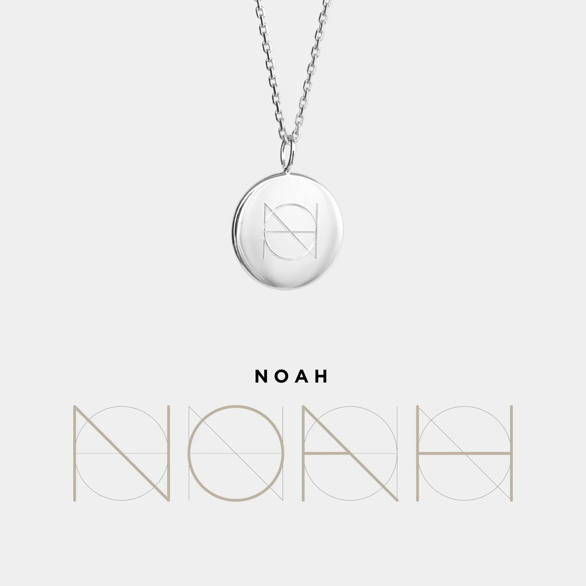 Custom engraved coin necklace in 925 sterling silver by Danibydsgn, featuring a unique Noah design.
