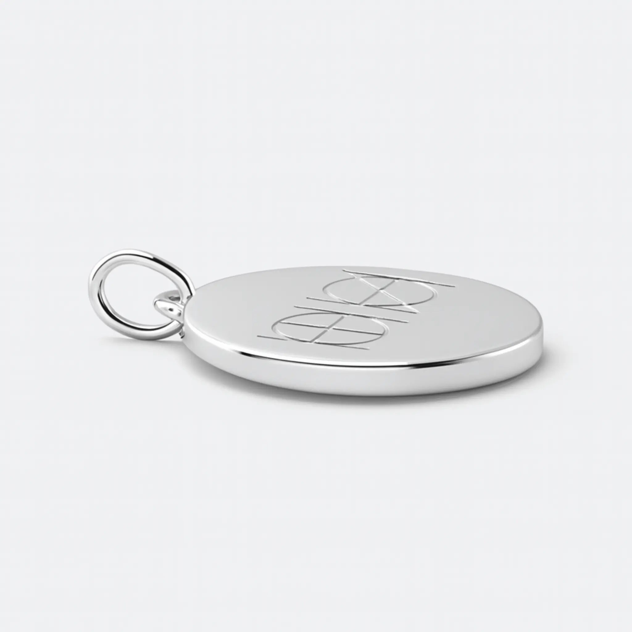 Engraved coin pendant necklace in 925 sterling silver, featuring a personalized design by Danibydsgn.