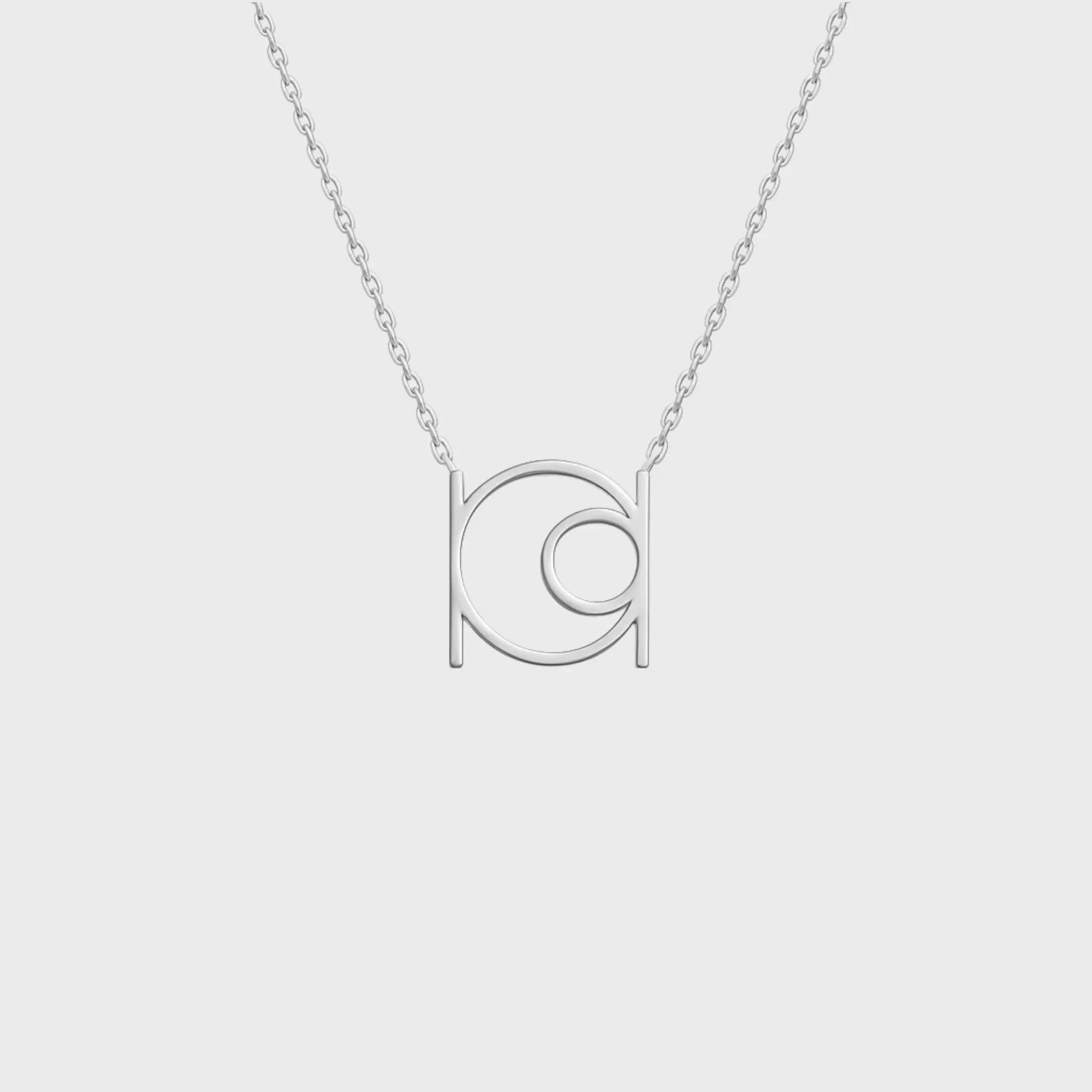 Danibydsgn custom symbol necklace in 925 sterling silver, featuring a cut-out silhouette pendant on a fine chain (front view).