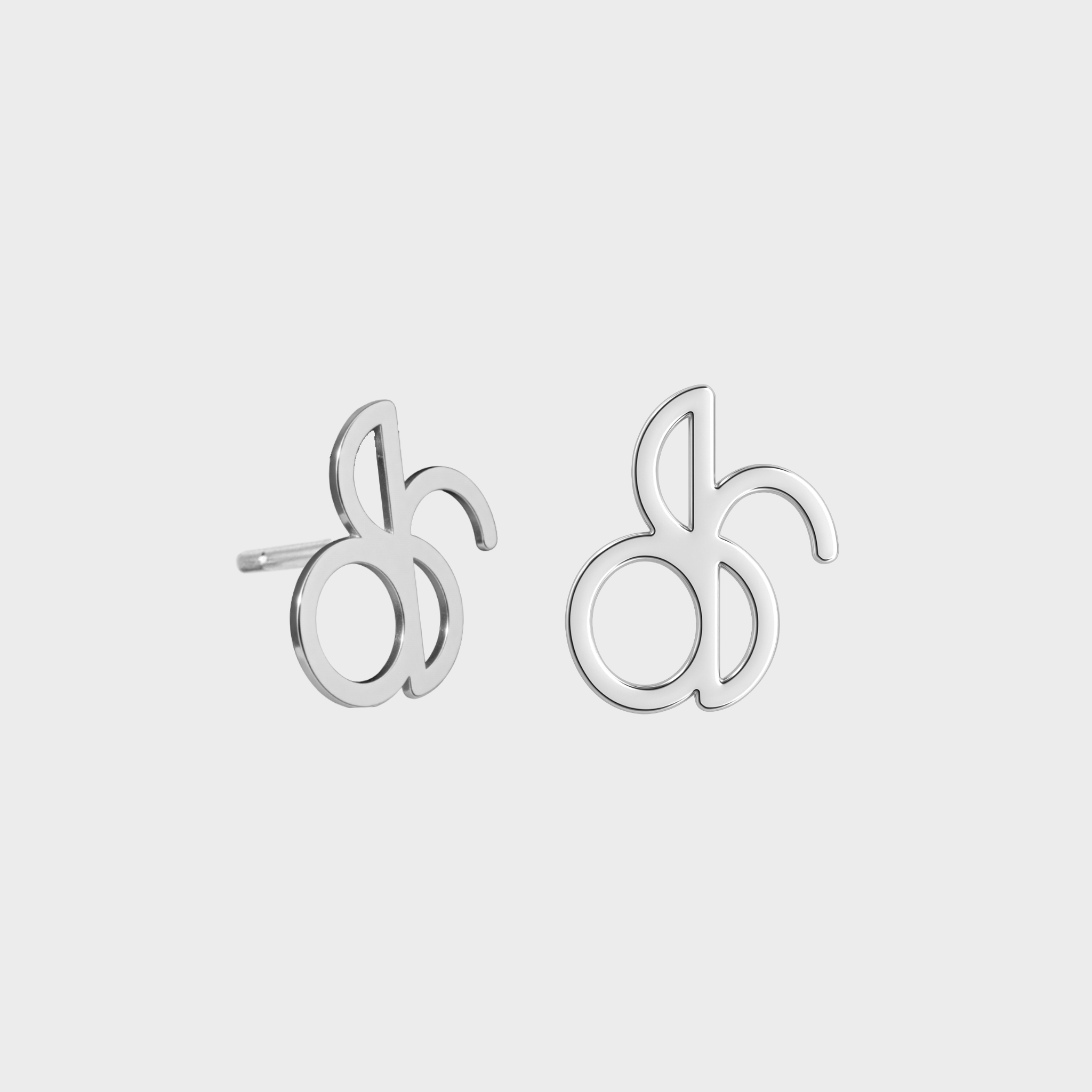 Danibydsgn custom symbol stud earrings in 925 sterling silver, featuring cut-out silhouette pendants from the customer’s Danibydsgn design (pair shown).