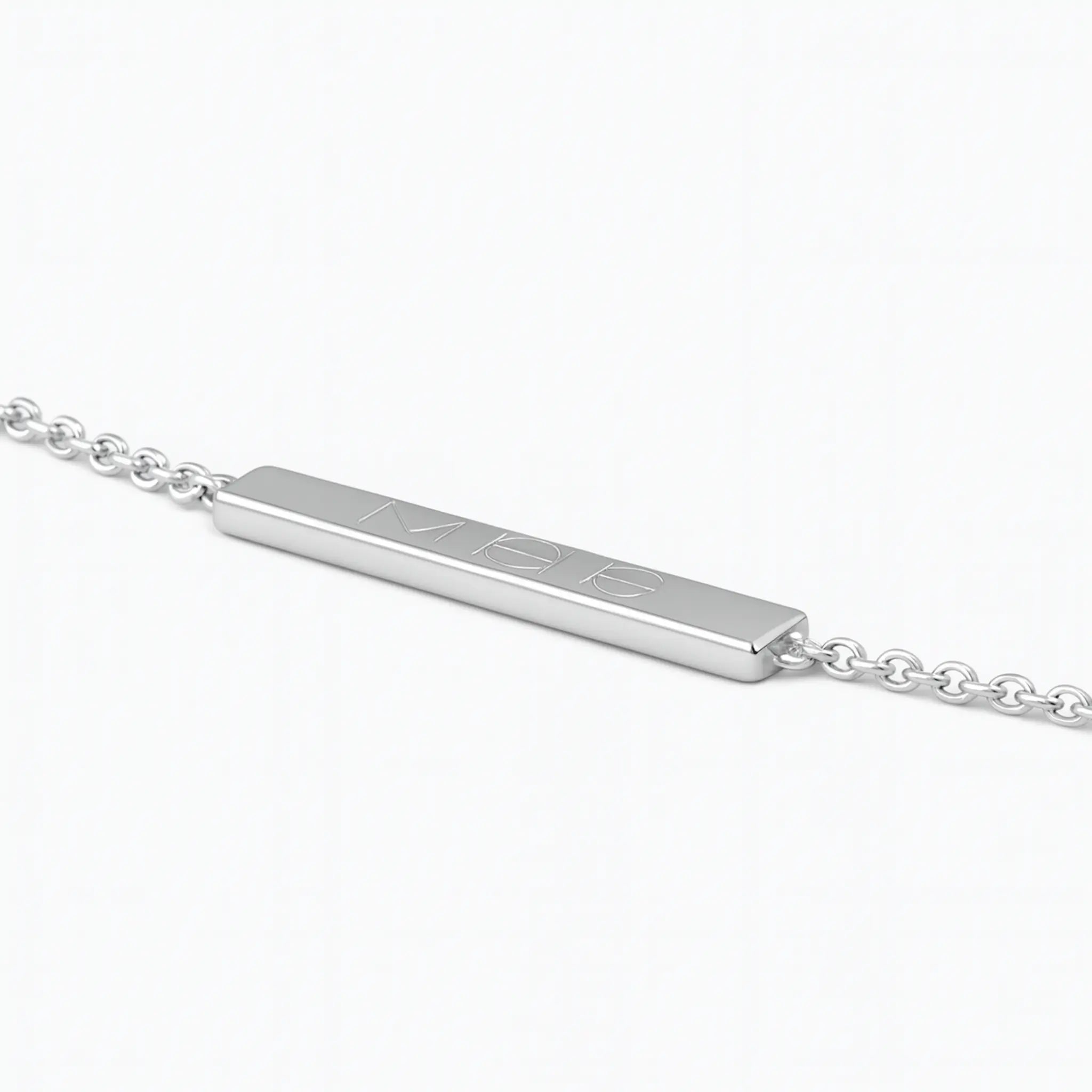 Engravable bar bracelet in 925 sterling silver with personalized design, angled view showcasing elegant craftsmanship.