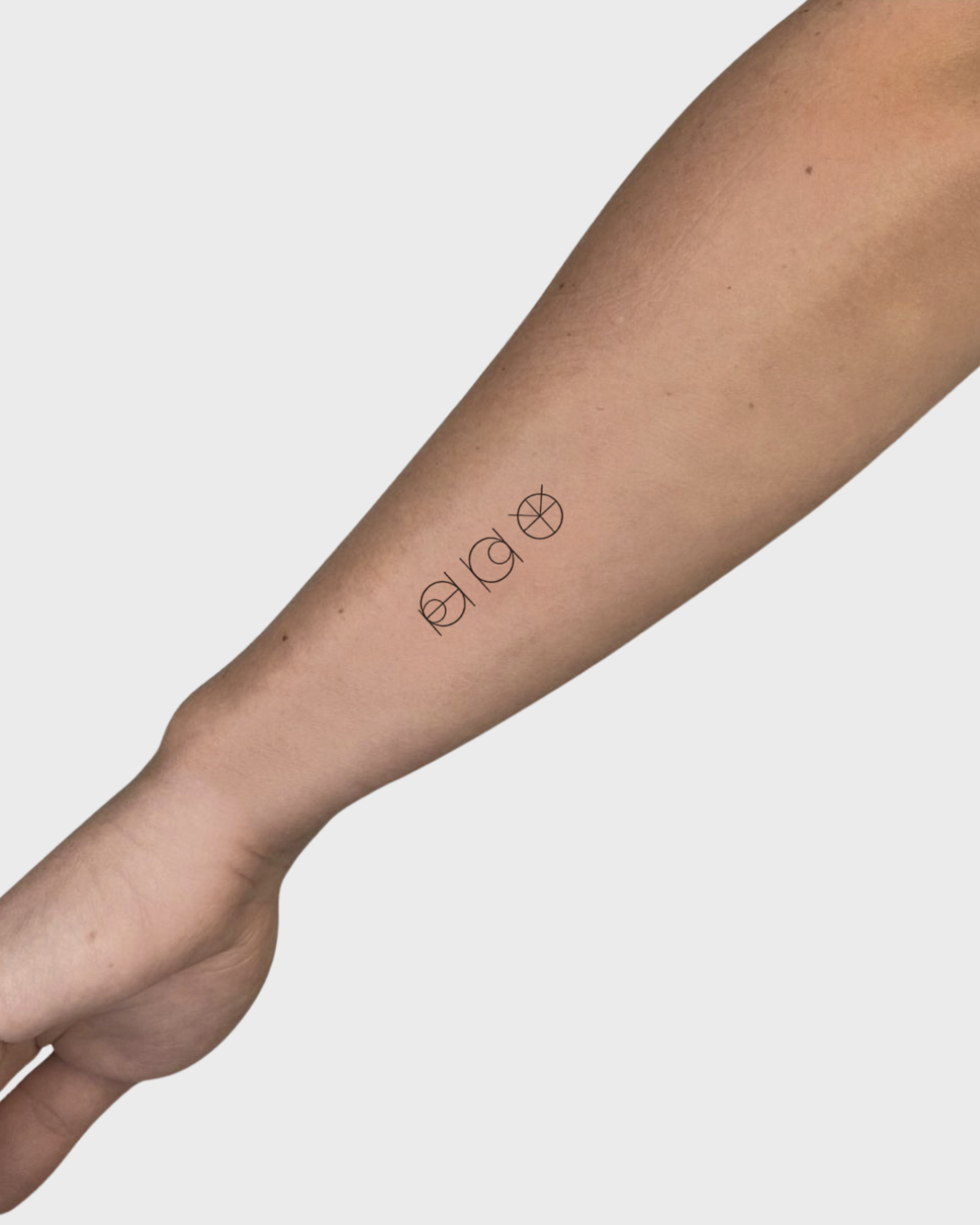 danibydsgn custom four symbol tattoo in lowercase design.  Custom premade tattoo design.  Flash tattoo.
