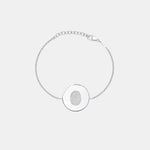Danibydsgn Single Fingerprint Coin Bracelet handcrafted in 925 Sterling Silver, featuring a 16mm polished coin pendant engraved with a single fingerprint design and attached to an adjustable diamond-cut chain for timeless elegance and personal connection.