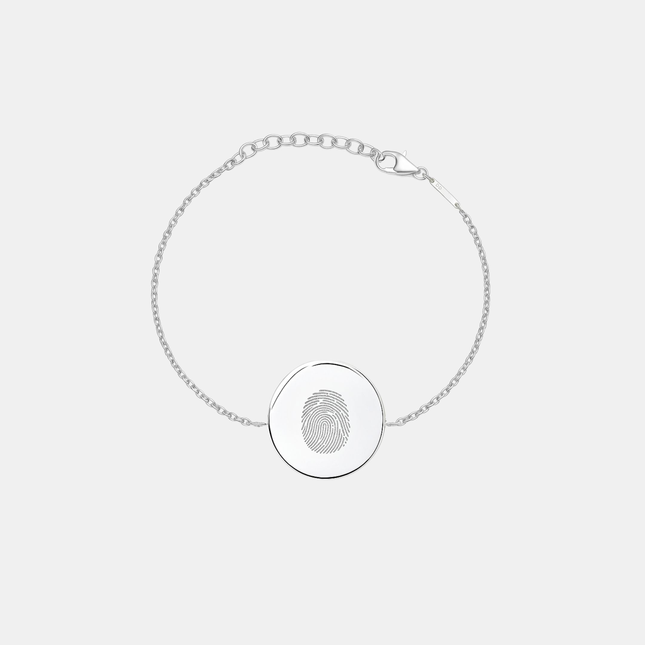 Danibydsgn Single Fingerprint Coin Bracelet handcrafted in 925 Sterling Silver, featuring a 16mm polished coin pendant engraved with a single fingerprint design and attached to an adjustable diamond-cut chain for timeless elegance and personal connection.