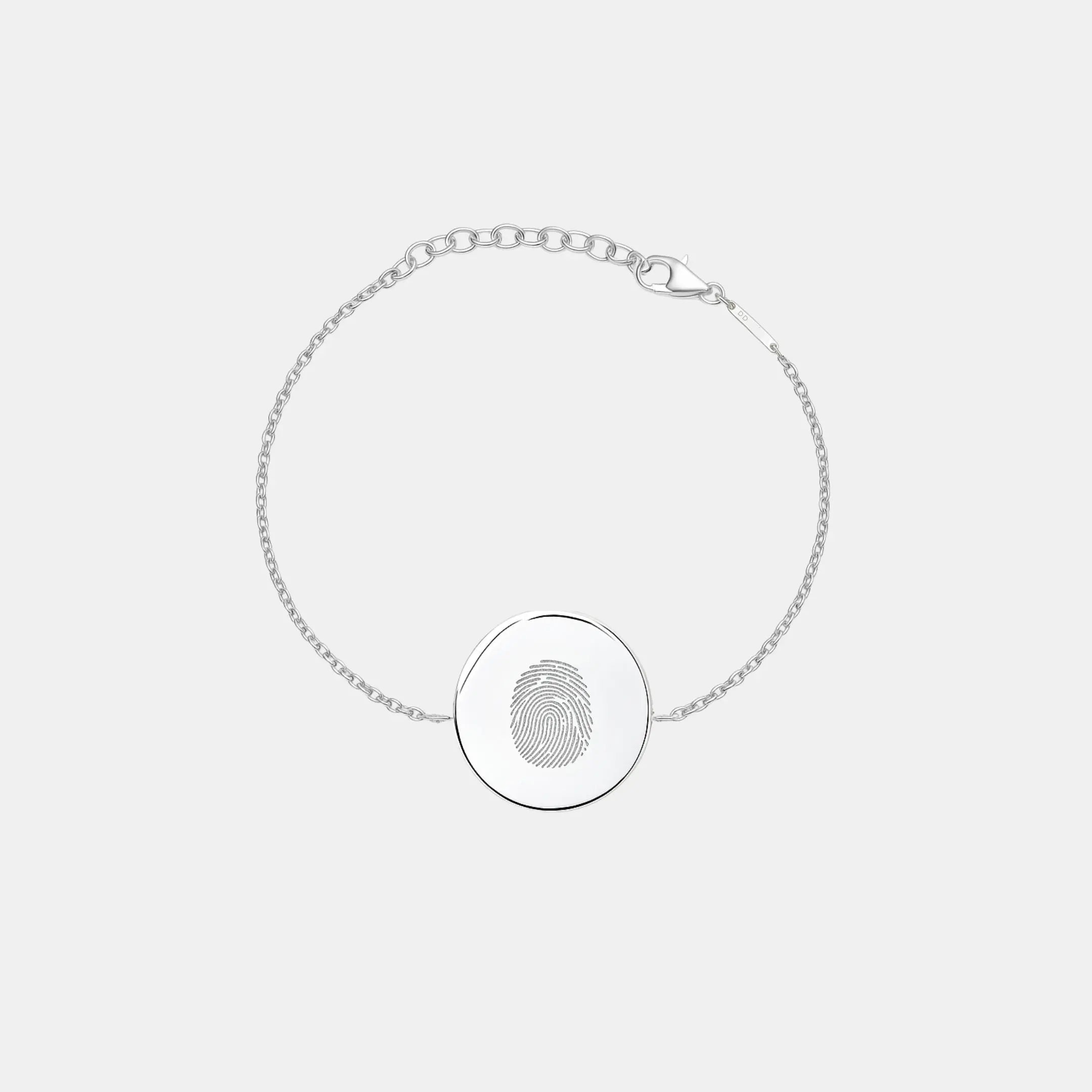 Single fingerprint coin bracelet in 925 sterling silver by Danibydsgn, showcasing a detailed fingerprint design.