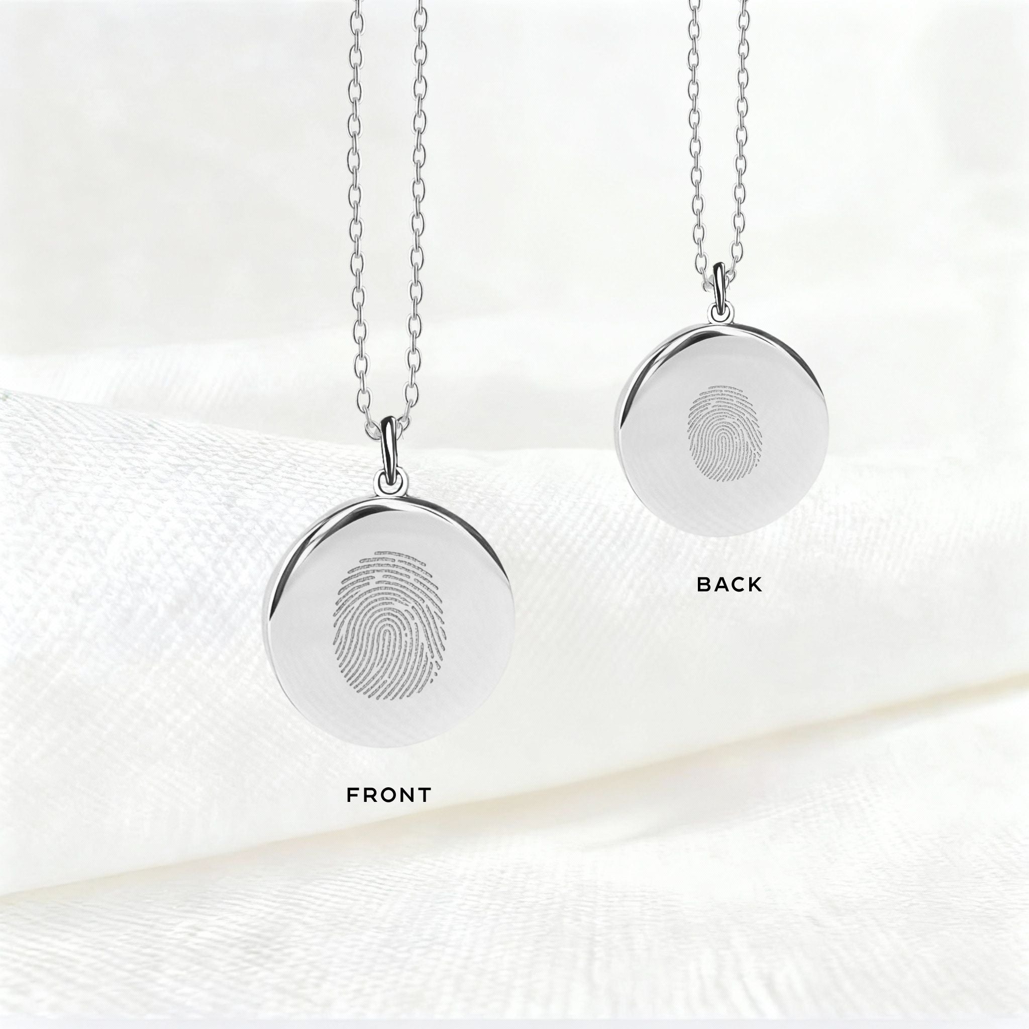 Front and back view of the Danibydsgn Single Fingerprint Pendant Necklace in 925 Sterling Silver, showcasing precision diamond-engraved fingerprints on both sides — a personalized keepsake of love, memory, and connection.
