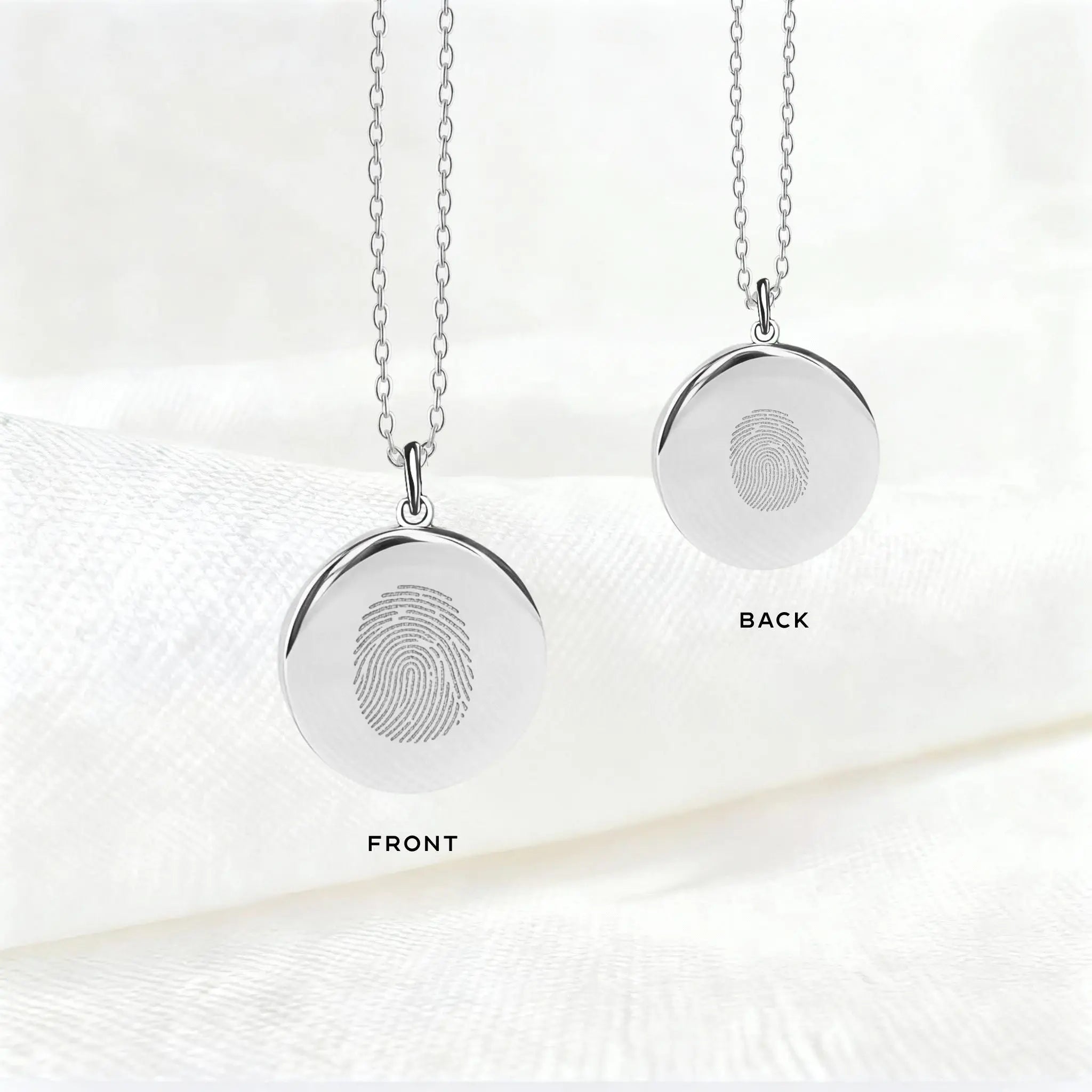 Front and back view of the Danibydsgn Single Fingerprint Pendant Necklace in 925 Sterling Silver, showcasing precision diamond-engraved fingerprints on both sides — a personalized keepsake of love, memory, and connection.