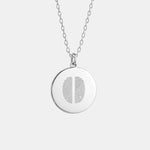 Danibydsgn Two Fingerprint Pendant Necklace in 925 Sterling Silver — a handcrafted keepsake featuring two diamond-engraved fingerprints on a polished 16mm coin pendant, symbolising connection, love, and timeless craftsmanship.