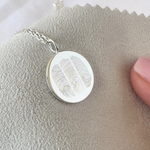 Close-up of the Luxury Three Fingerprint Coin Necklace in 925 Sterling Silver by Danibydsgn — showcasing engraved fingerprint details and premium fine jewelry craftsmanship.