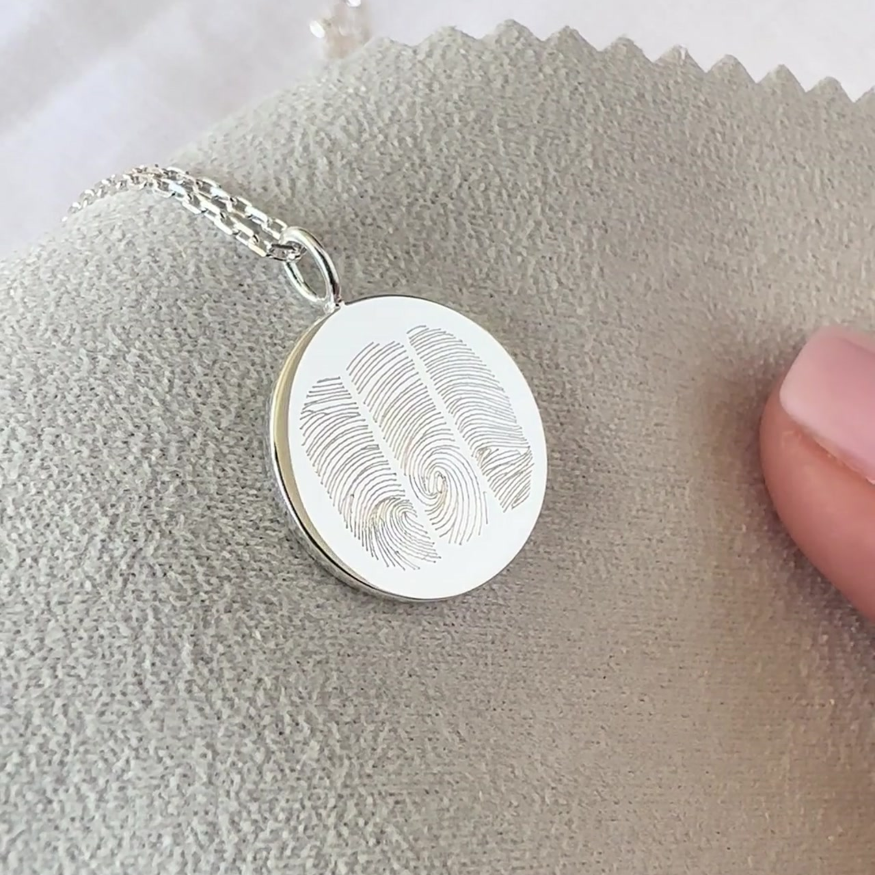Close-up of the Luxury Three Fingerprint Coin Necklace in 925 Sterling Silver by Danibydsgn — showcasing engraved fingerprint details and premium fine jewelry craftsmanship.