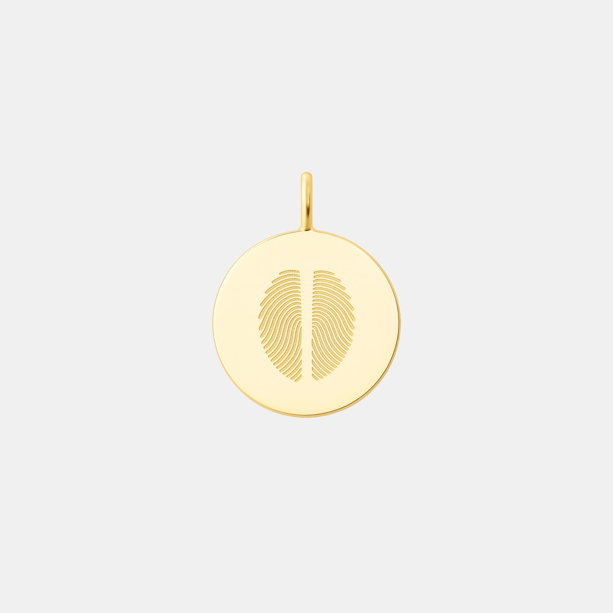 Minimalist two fingerprint pendant crafted in 18K gold vermeil by Danibydsgn. Features dual engraved fingerprints on a polished circular disc—an elegant, meaningful keepsake symbolizing love, unity, and connection. Perfect for luxury personalized jewelry collections.