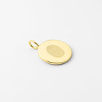 Single fingerprint pendant in 18K gold vermeil by Danibydsgn — a custom engraved keepsake jewelry piece designed to capture a loved one’s fingerprint in elegant detail. Perfect as a meaningful gift, memorial pendant, or luxury personalized necklace celebrating connection and memory.